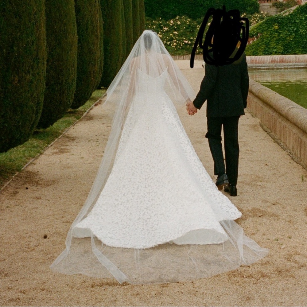 Elegant off white two tier cathedral raw edge veil.